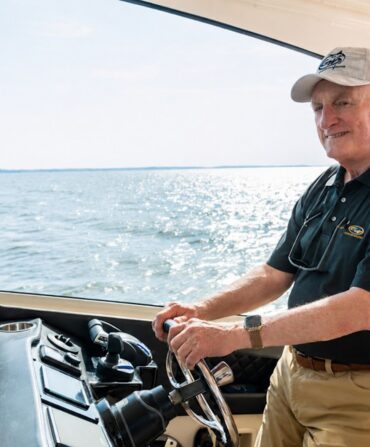 A man drives a boat