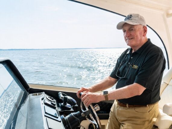 A man drives a boat