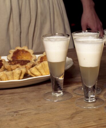 Syllabub and tarts on a table