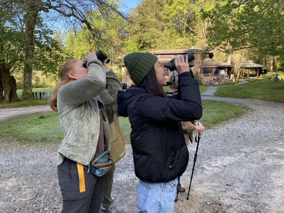 Two women with binoculars