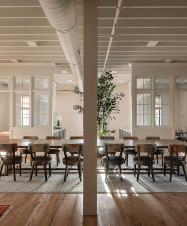 An office interior with chairs around a long table