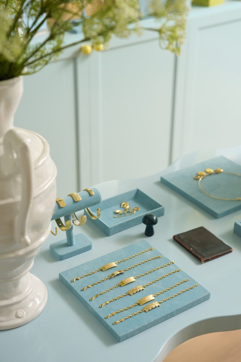 a gold jewelry display