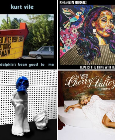 a photo of four albums