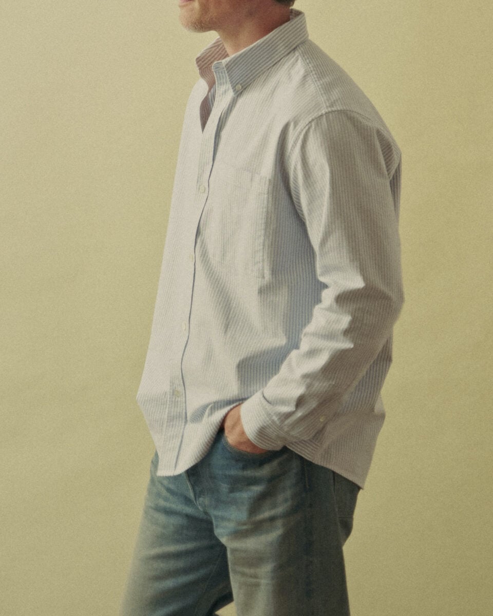 A man in an Oxford shirt