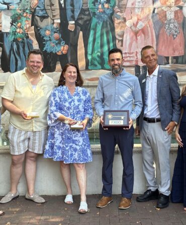 A group of people with city keys