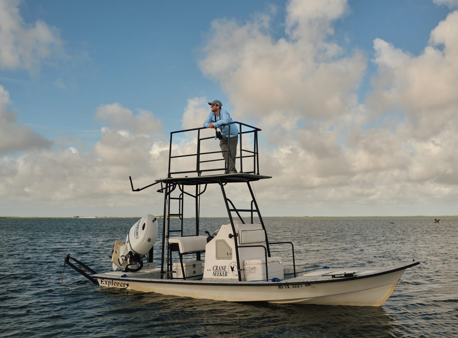 A man atop a boat