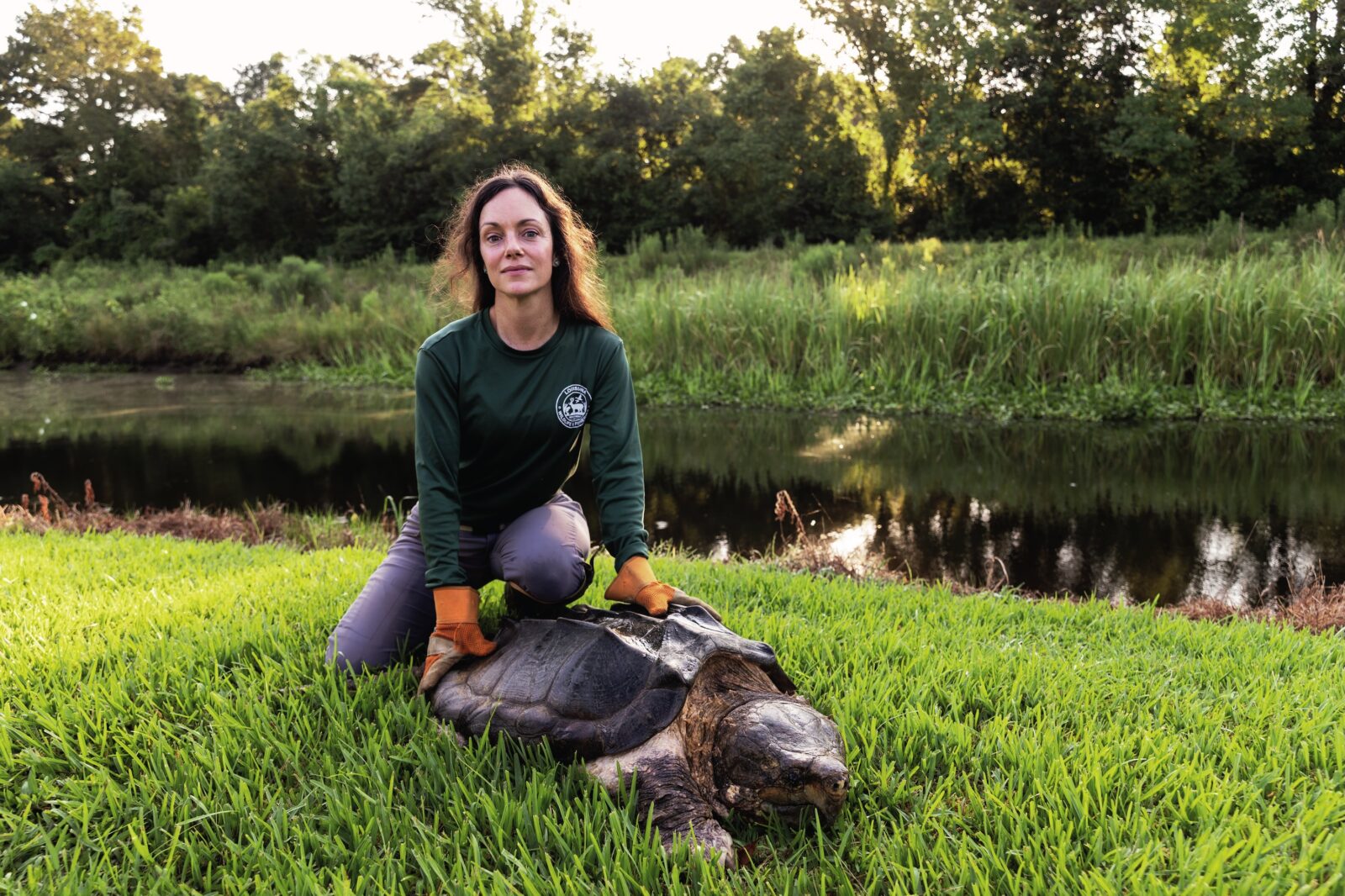 A woman with a turtle