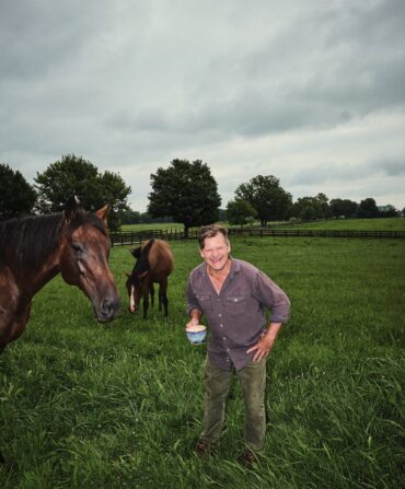 A man with two horses