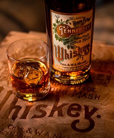whiskey glass and bottle