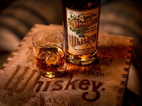 whiskey glass and bottle