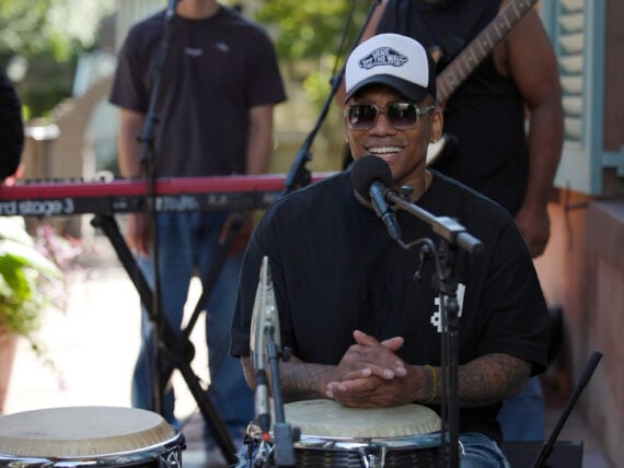 A man sitting at a drum set