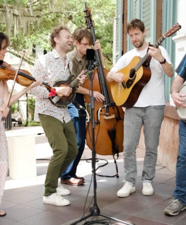 A group of musicians playing a song