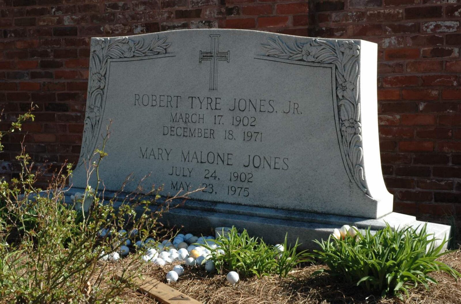 Golf balls at a grave