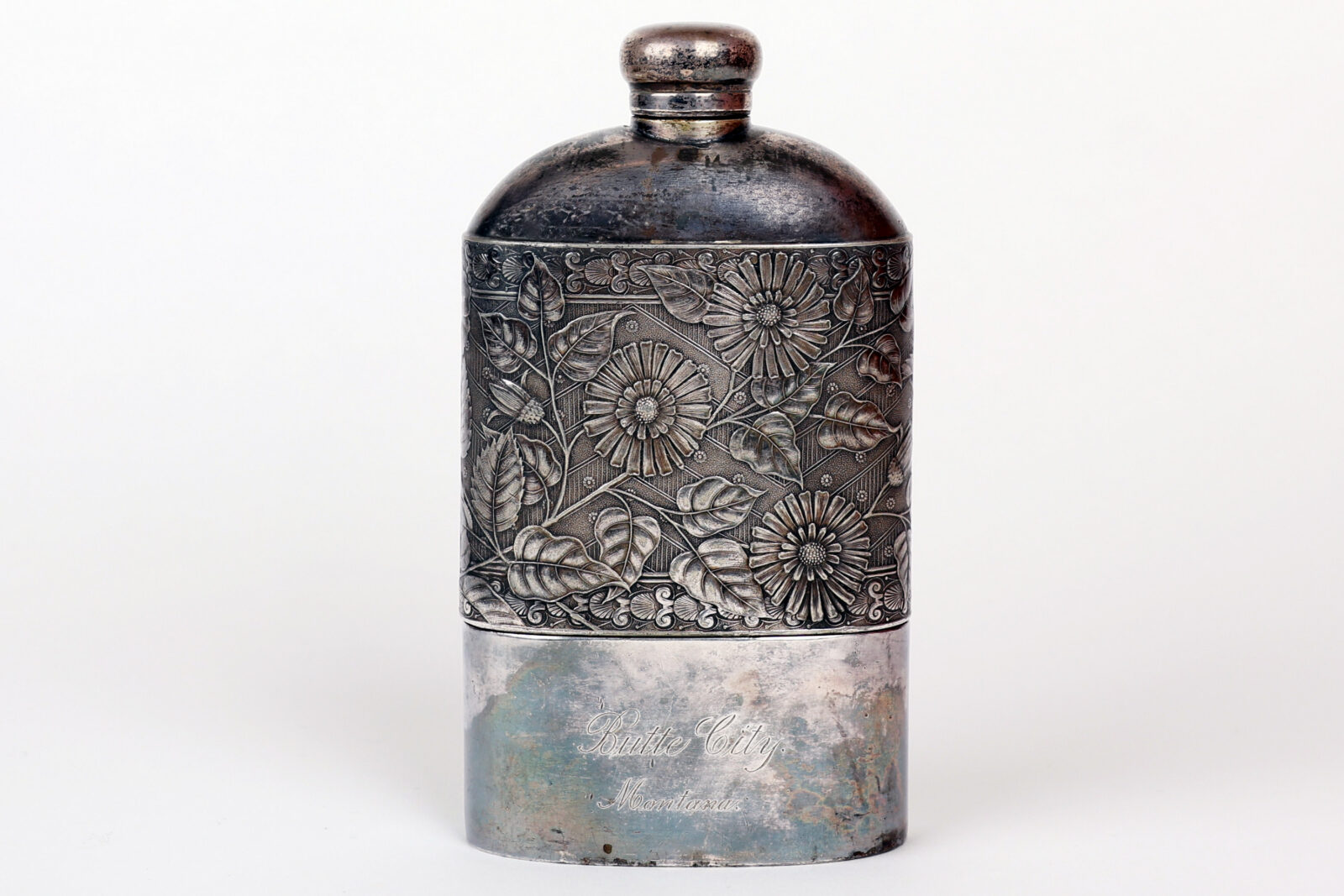 A vintage silver flask