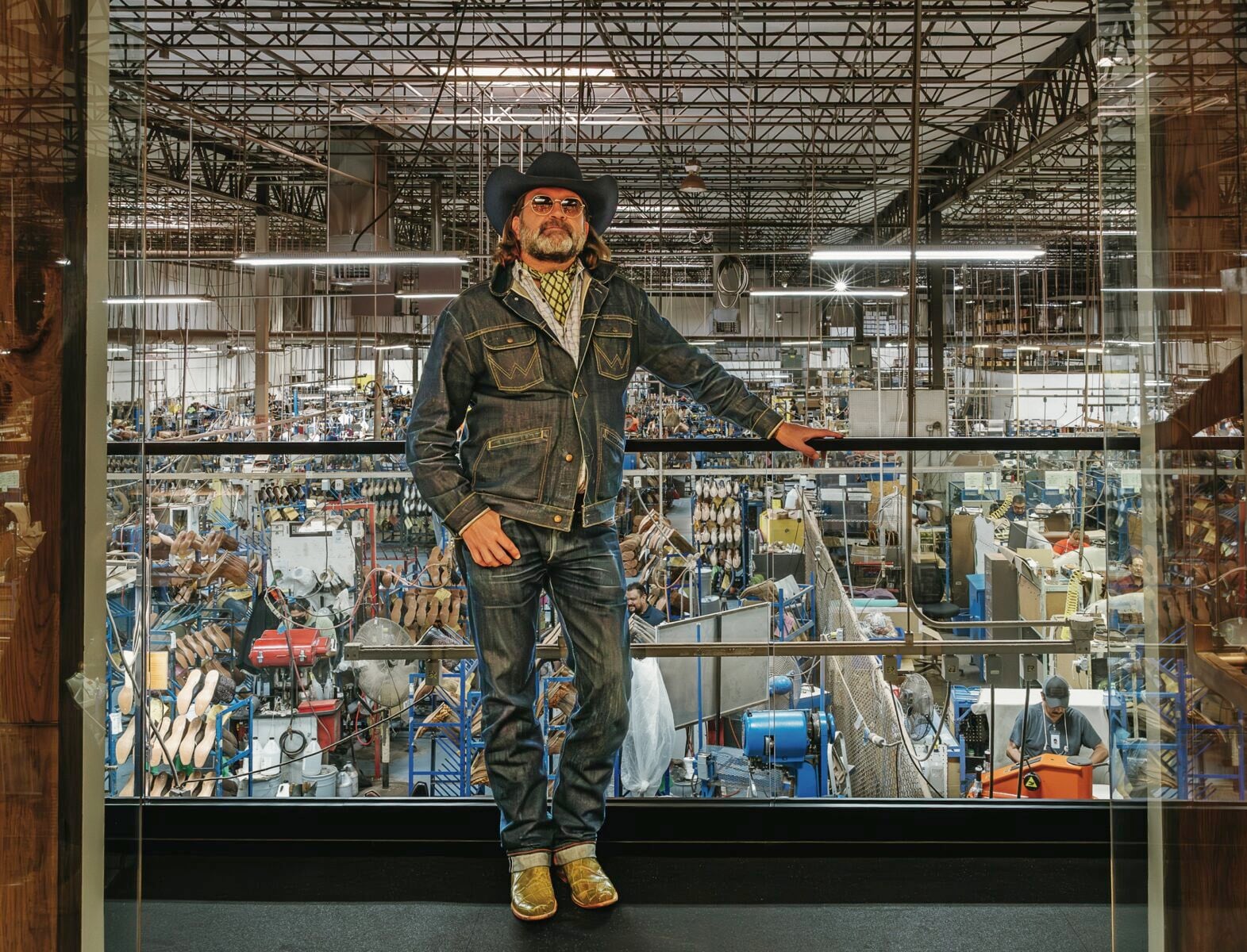 A portrait of a man in a factory