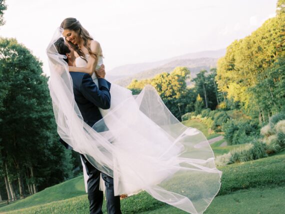 a bride and groom embrace